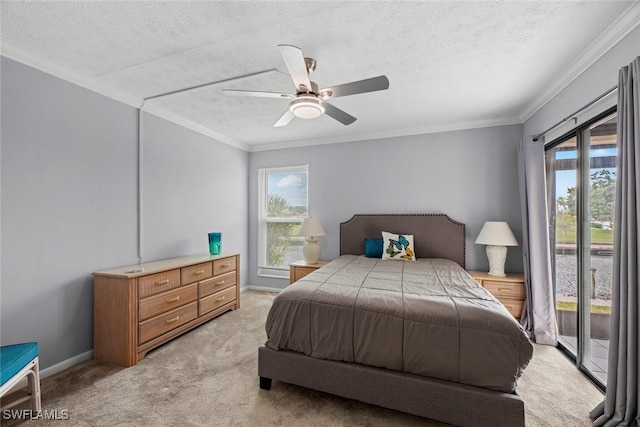 carpeted bedroom with multiple windows, a textured ceiling, access to exterior, and ceiling fan