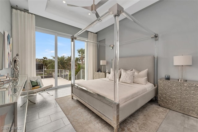 bedroom featuring access to exterior and ceiling fan