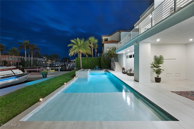 view of pool featuring a patio area