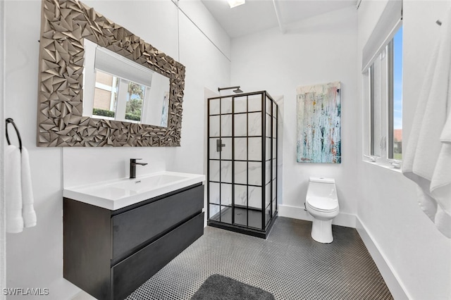 bathroom featuring vanity, tile patterned flooring, a shower, and toilet