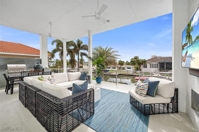 view of patio with ceiling fan, a grill, and outdoor lounge area