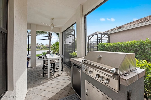 view of patio with ceiling fan, area for grilling, and glass enclosure