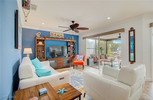 living room with ceiling fan, light tile patterned floors, and ornamental molding