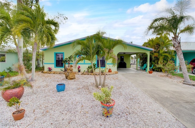 view of front of home with a carport