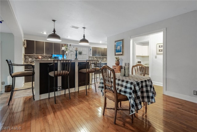 dining area featuring light hardwood / wood-style floors