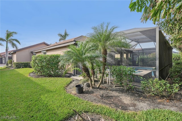 view of yard with a lanai