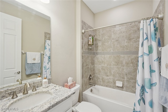 full bathroom featuring vanity, toilet, and shower / tub combo