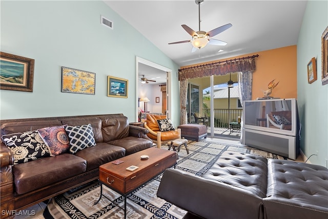 living room featuring lofted ceiling