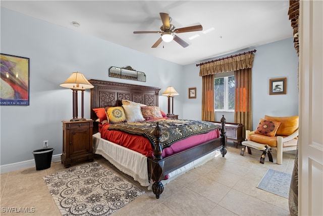 bedroom featuring light tile patterned floors and ceiling fan