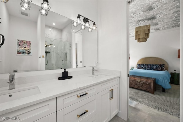 bathroom with vanity and an enclosed shower