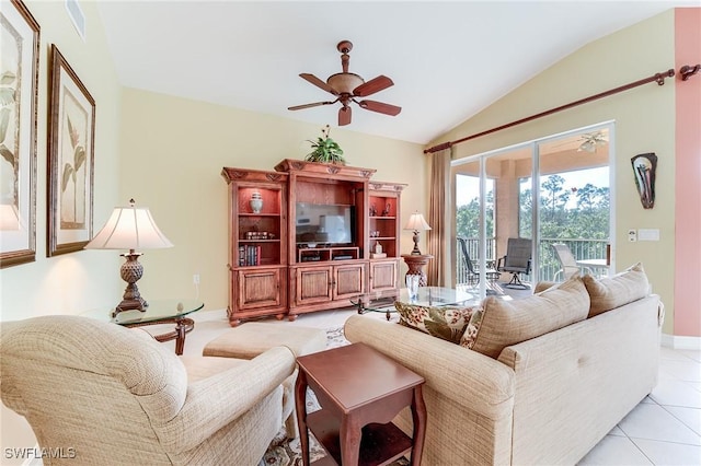 tiled living room with ceiling fan and lofted ceiling