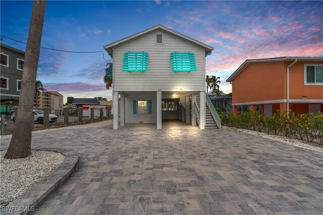 view of front of property with a carport