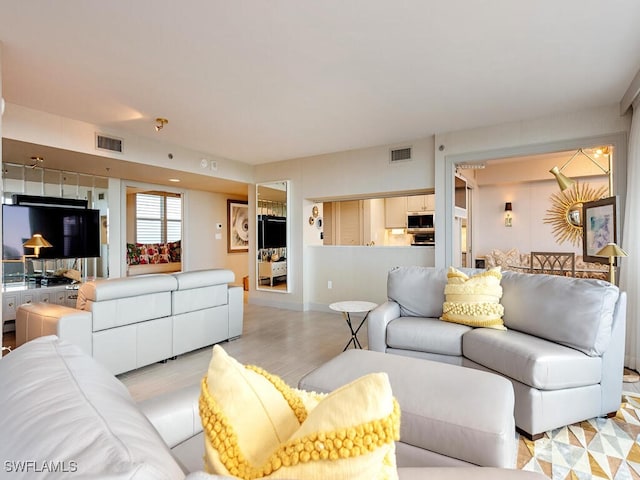 living room with light wood-type flooring