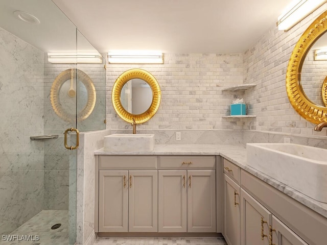 bathroom featuring vanity, an enclosed shower, and decorative backsplash