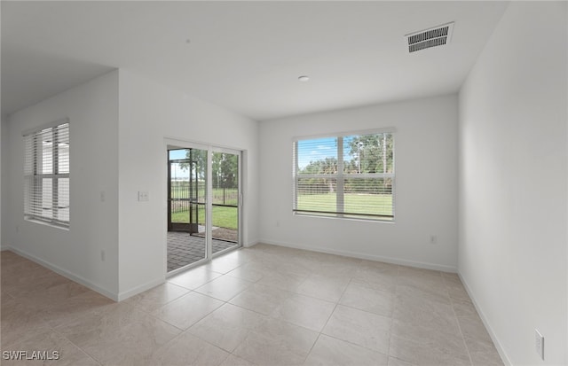 view of tiled empty room