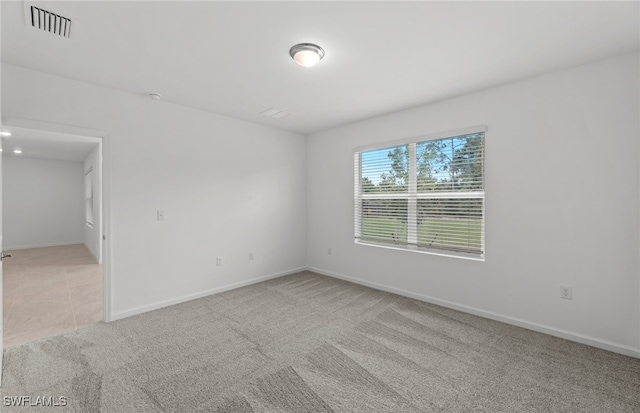 view of carpeted spare room