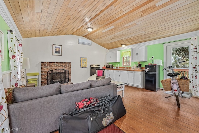 living room with wood ceiling, light hardwood / wood-style floors, vaulted ceiling, and a brick fireplace