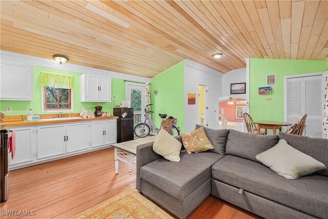 living room with sink, wooden ceiling, light hardwood / wood-style flooring, and vaulted ceiling