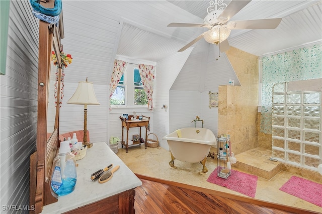 bathroom with wood-type flooring, lofted ceiling, and shower with separate bathtub