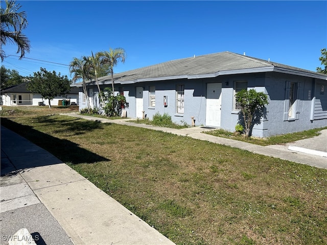 view of property exterior featuring a yard