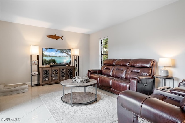 living room with light tile patterned floors