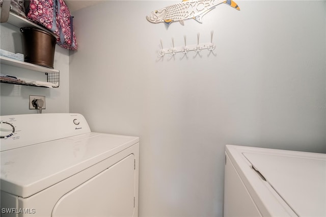 washroom with separate washer and dryer