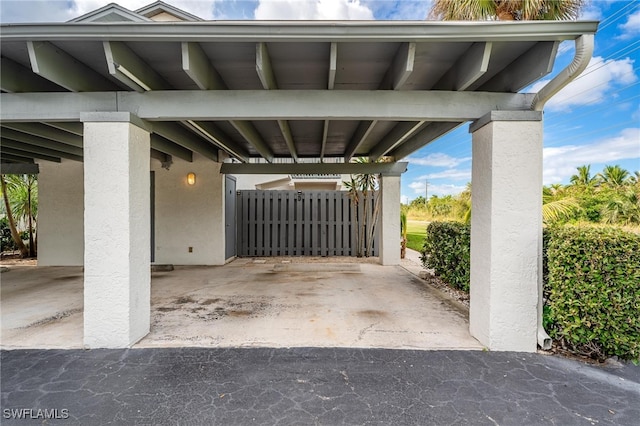 exterior space with a carport