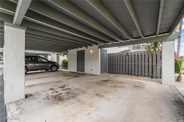 garage featuring a carport