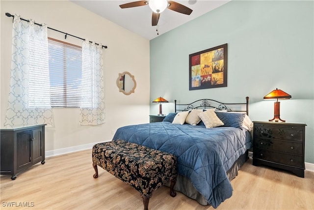 bedroom with ceiling fan and light wood-type flooring