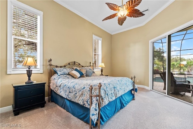 carpeted bedroom with access to exterior, ceiling fan, and ornamental molding