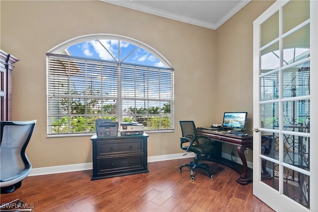 office area with crown molding, plenty of natural light, wood-type flooring, and french doors