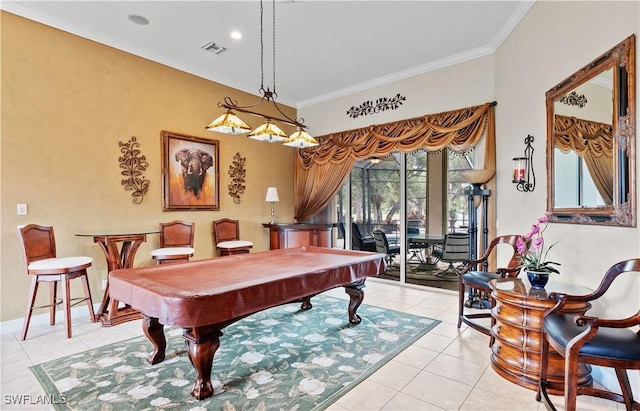 rec room with light tile patterned floors, crown molding, and billiards