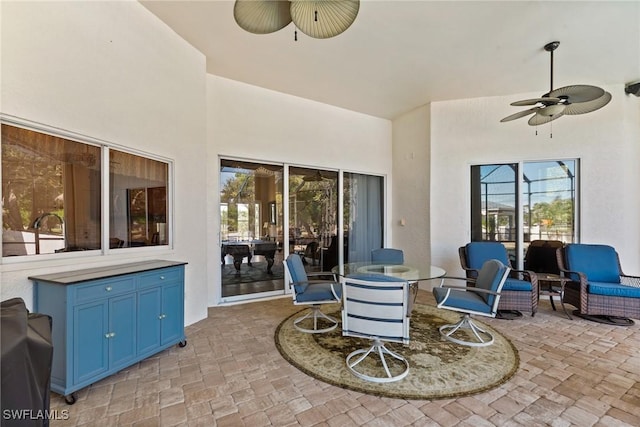 view of patio / terrace featuring ceiling fan