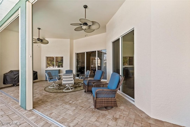 view of patio with ceiling fan