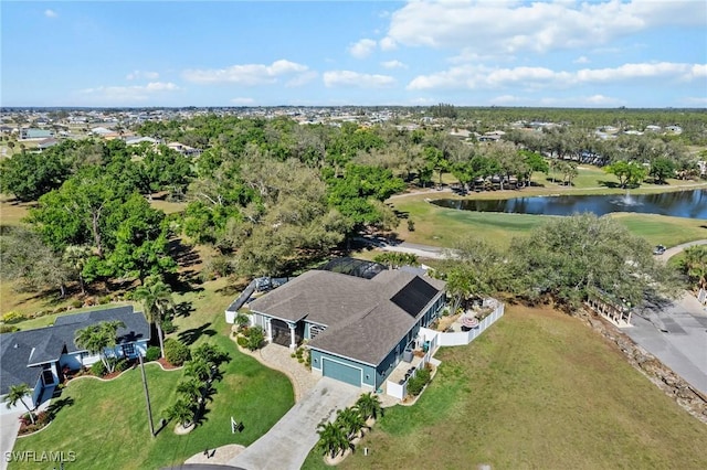 birds eye view of property featuring a water view