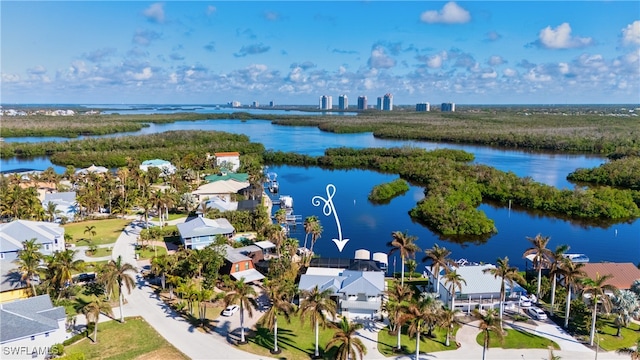 drone / aerial view with a water view