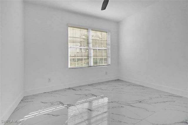 unfurnished room featuring ceiling fan