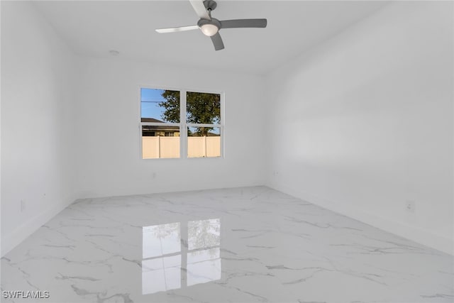 empty room featuring ceiling fan