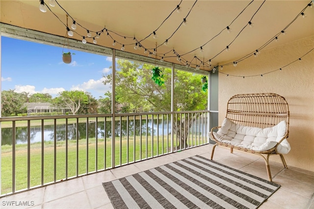 sunroom with a water view