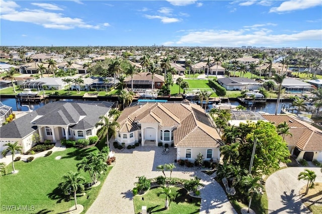 bird's eye view with a water view