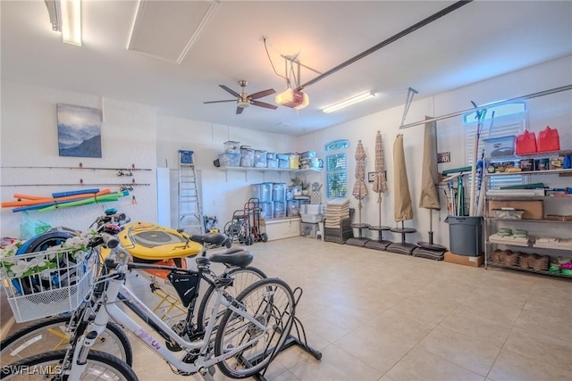 garage featuring ceiling fan and a garage door opener