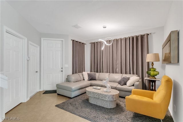 living room with a chandelier