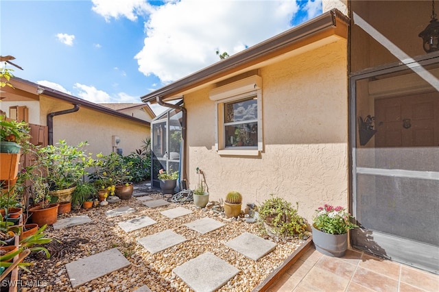 view of patio with a lanai