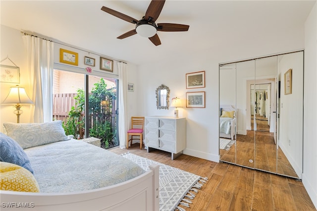 bedroom with access to outside, a closet, ceiling fan, and light hardwood / wood-style flooring