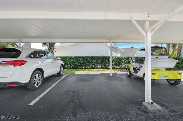 750 Mooring Line Dr Unit 105, Naples, FL 34102 - view of covered parking lot