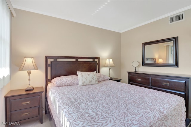 bedroom featuring ornamental molding