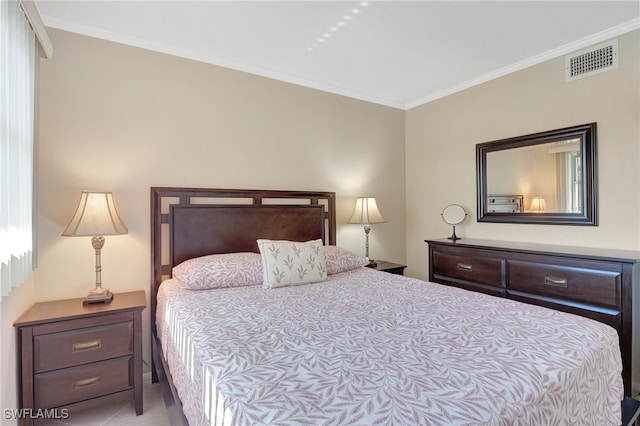 750 Mooring Line Dr Unit 105, Naples, FL 34102 - bedroom featuring crown molding