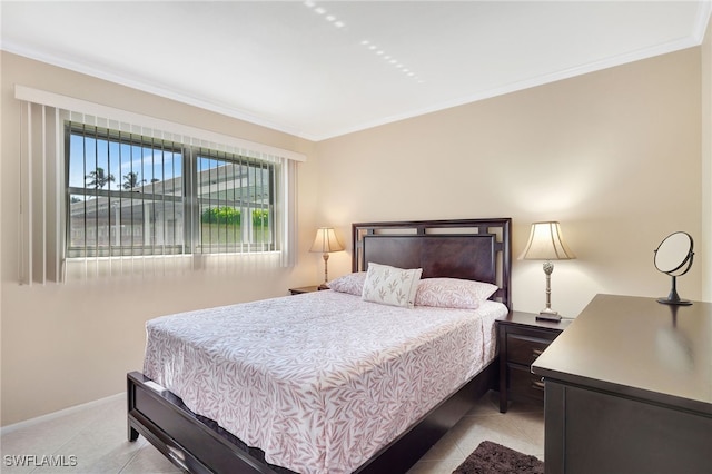 750 Mooring Line Dr Unit 105, Naples, FL 34102 - bedroom with light tile patterned floors, ornamental molding, and baseboards