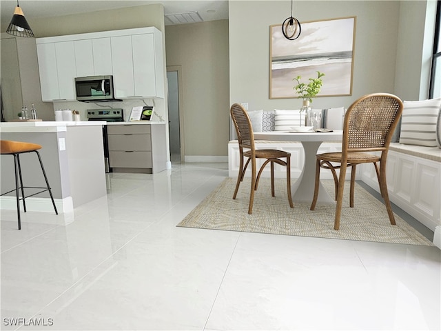 view of tiled dining area