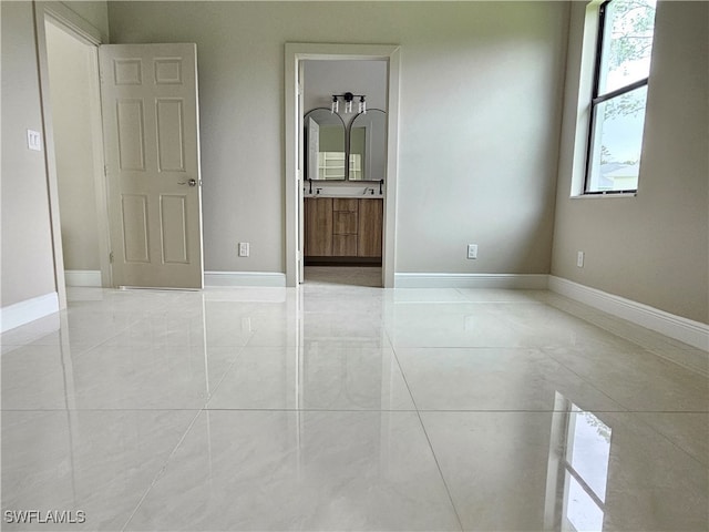 view of tiled spare room